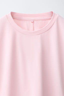 CAMISETA FLUIDA GYM CON MODAL / Rosa