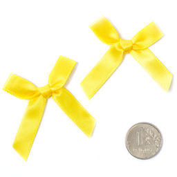 Бантики пришивные арт.MJ.RF.070.11 3,5см цв.11 желтый уп.100шт