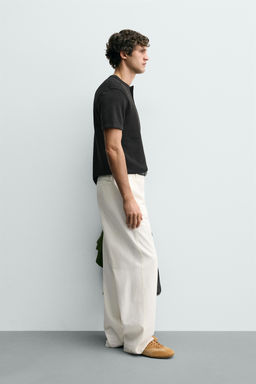 CAMISETA ESTRUCTURA CUELLO PANADERO / Negro