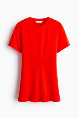 Top interlock con peplum