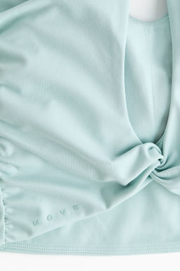 Top de tirantes SoftMove con detalle girado - H&m фото 9