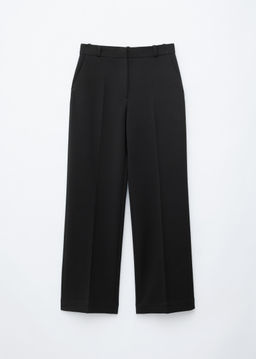 Pantalones sastre con pliegues marcados