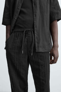 RELAXED FIT TEXTURED TROUSERS - Zara фото 5