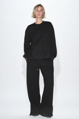 INTERLOCK TROUSERS WITH VENTS