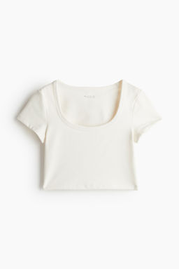 Top de deporte cropped con DryMove