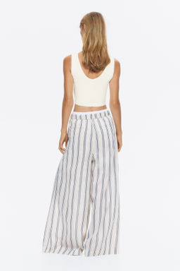 Top cropped sin mangas en punto fino - H&m фото 4