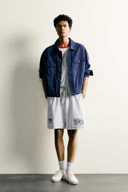 BERMUDA JOGGER BORDADO PARCHES / Gris vigor?