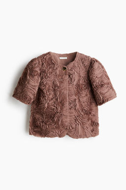 Chaqueta con aplicaciones