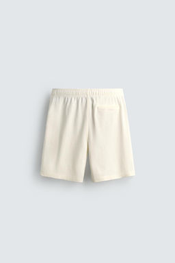 BERMUDA JOGGER REGULAR FIT / Blanco roto