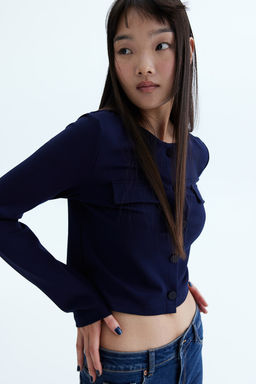 Cardigan de punto con bolsillos decorativos