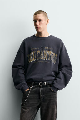 WASHED SWEATSHIRT WITH SLOGAN PRINT