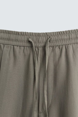 RELAXED FIT FLOWING TROUSERS - Zara фото 8