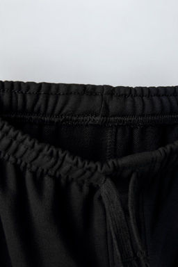 TROUSERS WITH EMBROIDERED SLOGAN - Zara фото 12