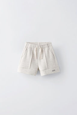 SLOGAN BERMUDA SHORTS WITH SEAM