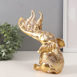 Фигурка полистоун «Слон и 3 слонёнка на хоботе. Индейские узоры», золото, 19.8×10.3×21.5 см