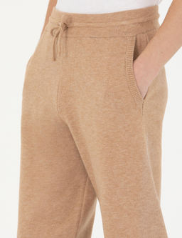 Бежевые зауженные трикотажные брюки с высоким воротником - Cacharel фото 6