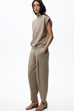 WASHED PLEATED TROUSERS