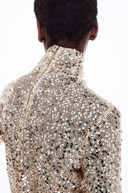 Top de lentejuelas con cuello perkins - H&m фото 2