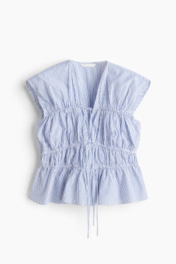 Blusa de popelina con cord?n de ajuste
