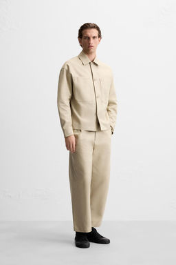 STRAIGHT-LEG PLEATED TROUSERS