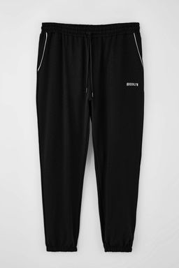 Siyah Buyuk Beden Regular Fit Bask?l? Biyeli Lastik Paca Esofman Alt? TMNSS26AJ00001