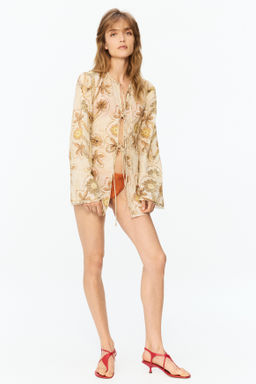 Blusa con estampado floral y lazadas - H&m фото 5