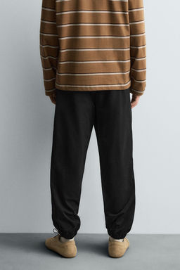 PANTAL?N CINTURA JOGGER SLIM FIT / Negro