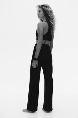 Pantalon de deporte acampanado en SoftMove - H&m фото 6