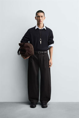 BALLOON FIT PLEATED JEANS