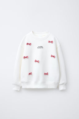 SWEATSHIRT WITH SLOGAN AND BOWS