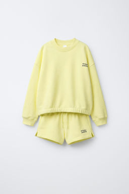 CONJUNTO SUDADERA Y BERMUDA TEXTO / Amarillo