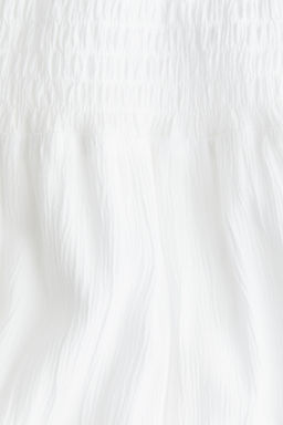 Falda escalonada con cintura nido de abeja - H&m фото 5