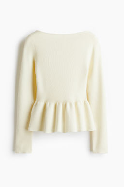 Top de punto con peplum