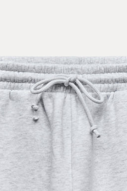 PLUSH JOGGING TROUSERS WITH SLOGAN - Zara фото 10