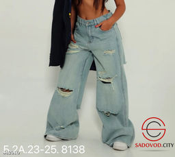 Джинсы широкие с рваным эффектом