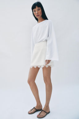 FALDA PANTAL?N BAJO ENCAJE / Crudo