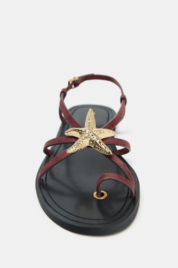 STRAPPY SANDALS WITH METAL DETAIL