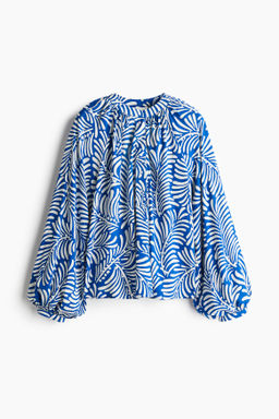 Blusa con mangas globo