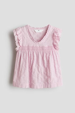 Blusa con manga circular