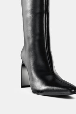 POINTED TOE HEELED BOOTS