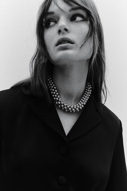 Americana entallada de saten