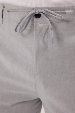 Ac?k Gri Slim Fit Beli Baglama Detayl? Lastikli Kumas Dokuma Pantolon TMNAW25PL00027