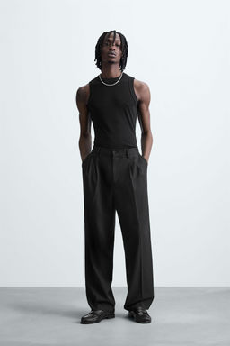 FLOWING WIDE-LEG PLEATED TROUSERS