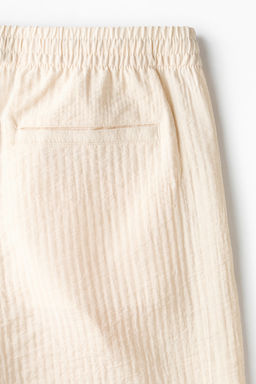 Pantal?n corto texturizado Relaxed Fit - H&m фото 9