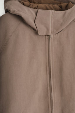 TECHNICAL COTTON HOODED JACKET