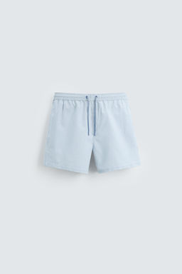 MID-LENGTH SEERSUCKER SWIMMING TRUNKS