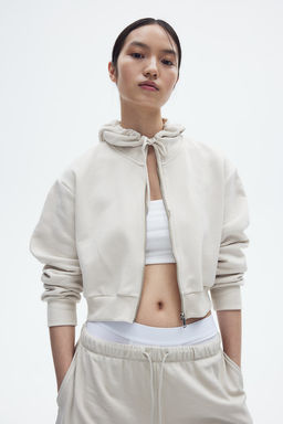 Chaqueta sudadera cropped con capucha y cremallera