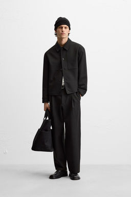 RELAXED FIT PLEATED TROUSERS