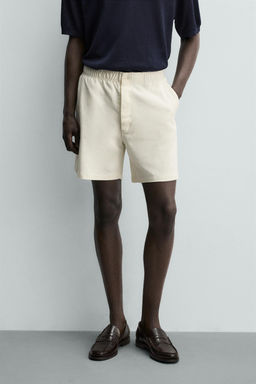 BERMUDA JOGGER REGULAR FIT / Blanco roto