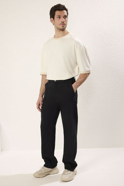 TRENDYOL MAN Siyah Baggy/Bol Paca Gabardin %100 Pamuklu Rahat Pantolon TMNSS25PL00021